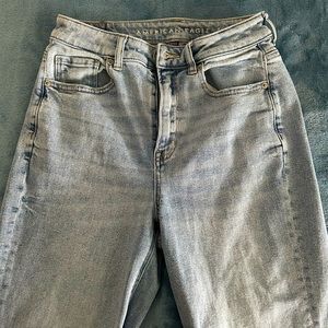 Light wash stretch straight leg AE jeans